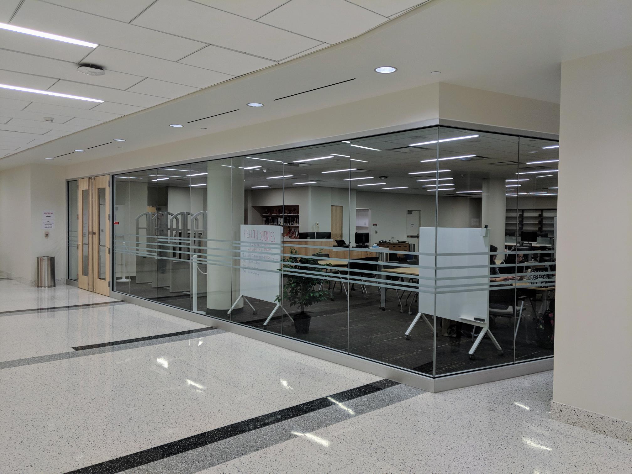 View of the Health Sciences Library from the hallway of Health 1 building