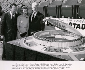 County Judge Bill Elliot, Mrs. Elliot, and R. E. Smith, Chairman of the Board, Houston Sports Association looking at a model of the world's first domed, air-conditioned stadium--future home of the Colt .45s.