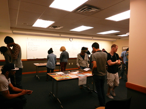 AAS 3301 students peruse items from the Houston Hip Hop Collection