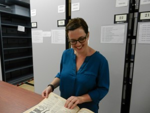 At work in the stacks.  We welcome Sara Craig to the University of Houston Special Collections, University Archives team.