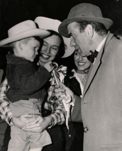 Honorary Mayor Johnny Goya III presents Humphrey Bogart with the key to Fiesta City (1952, UH Frontier Fiesta Collection)